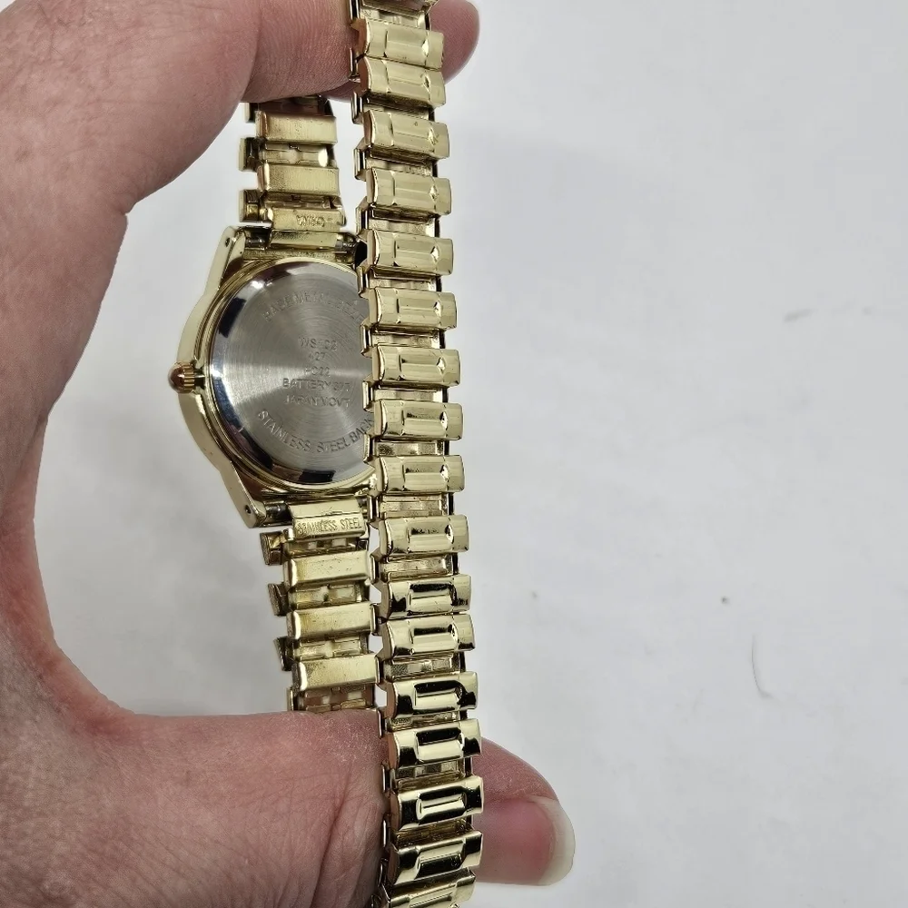 gold tone stretch watch with rhinestone case